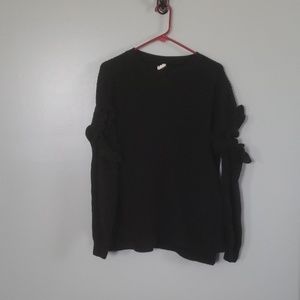 Black sweater with cold arm cut outs